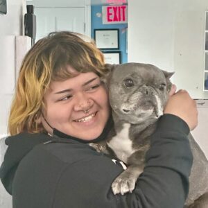 Nicole the dog walker with Mila the French Bulldog